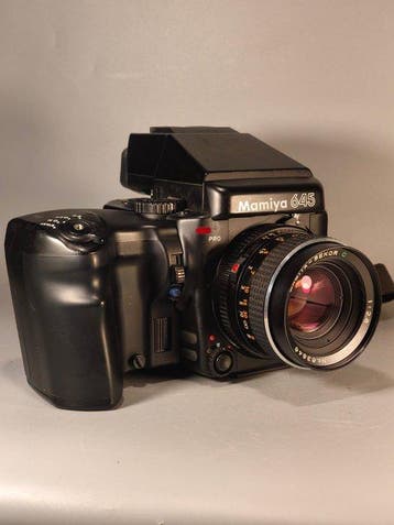 Mamiya 645 PRO + dorso polaroid + flash + Sekor 80mm +, Nieuw