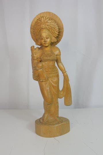 Handgeschnitzte balinesische Frauenfigur mit Kind –
