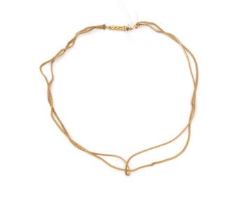 Een 18 krt. geelgouden UnoAErre schakelcollier, Gebruikt