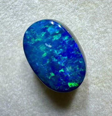 Opaal Cabochon - Hoogte: 11 mm - Breedte: 7 mm- 0.54 g - (1)