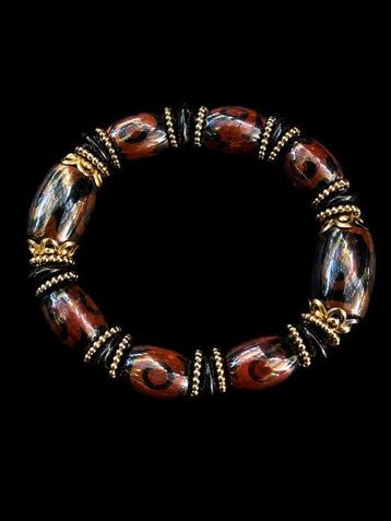 Tibetaanse armband met geldhaak - Trek fortuin en geluk aan