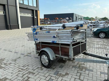 Alumexx rolsteiger 8,2m met aanhanger – Gebruikt!, Doe-het-zelf en Verbouw, Steigers, Ophalen, Nieuw, Daksteiger, 5 meter of hoger