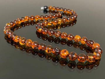 Glanzende cognac-amber ronde kralen ketting - The Baltic, Nieuw