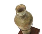 Een glazen fles, vermoedelijk Romeinse Rijk, 3e-4e eeuw