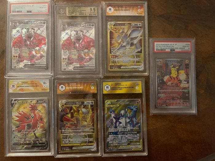 Pokémon - 8 Graded card - Charizard, Detective Pikachu PSA, Hobby en Vrije tijd, Verzamelkaartspellen | Pokémon