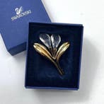 Swarovski - Kristalbloemmotief, goudkleurig metaal, met