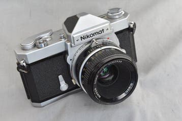 Nikon Nikomat + 2/50mm Nikkor Analoge camera, Audio, Tv en Foto, Nieuw