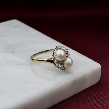 Gouden ring met parel en diamant 0,28 ct., Gebruikt, 20 of groter, Ophalen of Verzenden, Met edelsteen