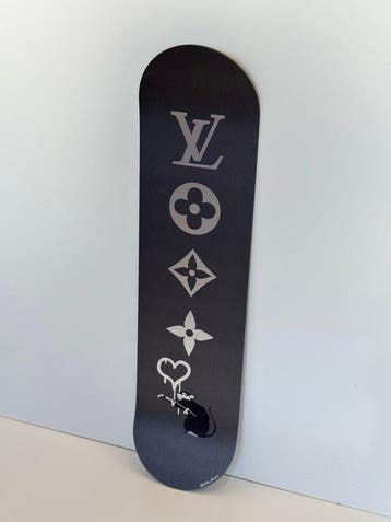 Rob VanMore - Skating by LV x Banksy Rat