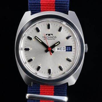 Technos - Day-Date - Zonder minimumprijs - Heren - 1970-1979, Nieuw