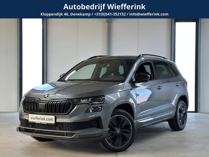 Zakelijke Lease |  Škoda Karoq 1.5 TSI ACT Sportline Busines, Auto's, Skoda, Dealer onderhouden, Lease, Zwart, Automaat, SUV of Terreinwagen