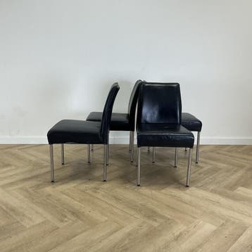Complete set van 4 eetkamestoelen,  donker blauw - rvs poot, Ophalen of Verzenden, Gebruikt, Leer