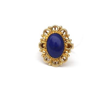 Een 14 krt. geelgouden ring met lapis lazuli, Gebruikt