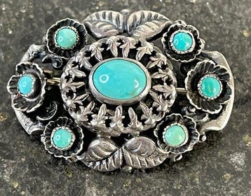 Vintage Zweedse zilveren broche met 7 natuurlijke turkoois