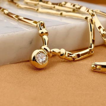 Gouden staafjes schakelcollier met vaste hanger en zirconia, Gebruikt, Ophalen of Verzenden, Met edelsteen, Goud