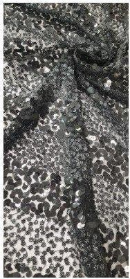Tessuto ricamato con paillettes – effetto couture da sera -