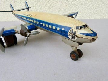 Joustra - Speelgoed vliegtuig vintage tin airplane—an Air