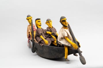 Een boot met roeiers, Mali