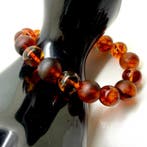 Armband met Baltische barnsteen kralen in cognakkleur. -