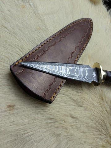 Handcrafted Damascus Hunting Knife with Sculpted Ebony Wood