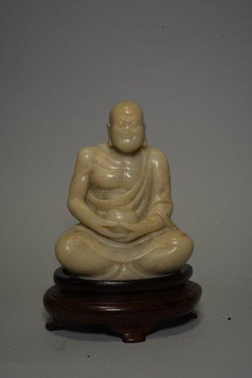 Twintigste-eeuwse stenen figuur van een Arhat