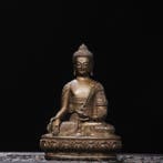 A Barss and gilt Ruyi Guanyin figure from a private