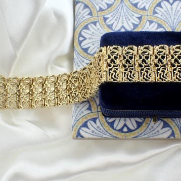 Gouden brede fantasie schakelarmband, Ophalen of Verzenden, Gebruikt, Goud, Goud