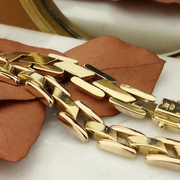 Bicolor gouden Bismarck schakelarmband, Ophalen of Verzenden, Gebruikt, Goud, Goud