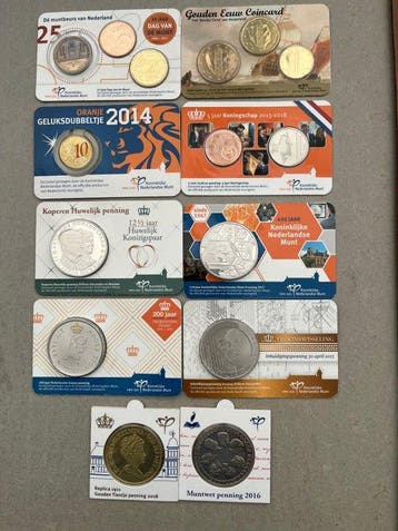Nederland. 8 Coincards en 2 penningen in KNM munthouders