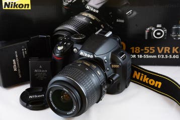 Nikon D3100 met 18-55mm VR kitlens in TOP STAAT 8304 clicks, Spiegelreflex, Ophalen of Verzenden, Zo goed als nieuw, Nikon