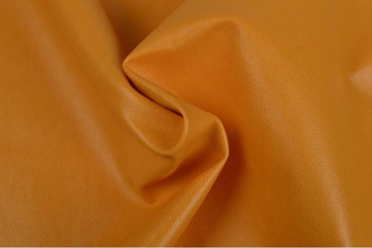 10 meter kunstleer - Okergeel, Hobby en Vrije tijd, Stoffen en Lappen, 120 cm of meer, 200 cm of meer, Geel, Nieuw, Leer of Kunstleer