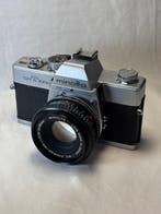 Minolta SRT 100 b (1975) + Rokkor-PF 2/50mm | Single lens, Audio, Tv en Foto, Fotocamera's Analoog, Nieuw
