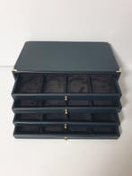 Accessoires. Black eco-leather coin cabinet for 32 places