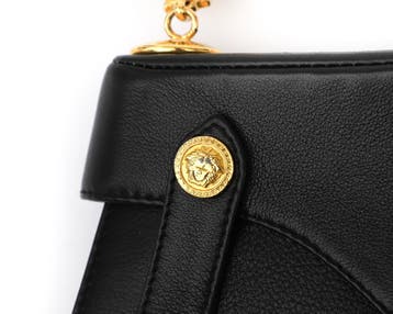 Een Gianni Versace handtas, ca. 1990, Gebruikt