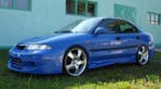 SK-Import Voor Bumper Polyester Mitsubishi Carisma, Auto-onderdelen, Voor, Nieuw, Ophalen of Verzenden, Mitsubishi
