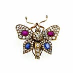 Gouden broche van een vlinder met diamant, robijn en saff..., Gebruikt, Overige kleuren, Ophalen of Verzenden, Met edelsteen