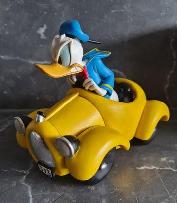 Donald Duck in an angry yellow car - 1 Figurine - Disney -, Verzamelen, Nieuw