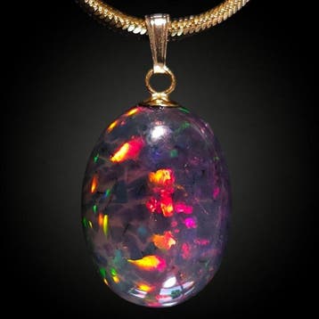 Geen minimumprijs – 11,55 ct Opal met vurige rode mozaïek