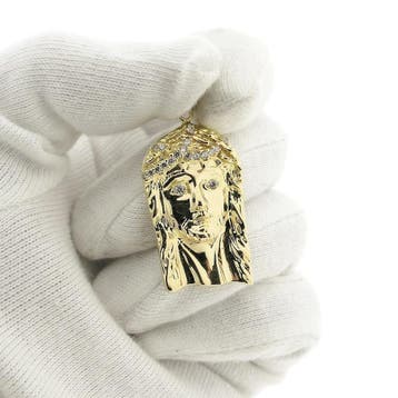Gouden hanger met het gezicht van Jezus en zirconia, Ophalen of Verzenden, Gebruikt, Goud, Overige merken