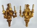 Decoratief ornament - Een paar vergulde wandlampen. - Italië