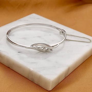 Witgouden slavenarmband met diamanten; 0,17 ct., Gebruikt, Ophalen of Verzenden, Met edelsteen, Goud