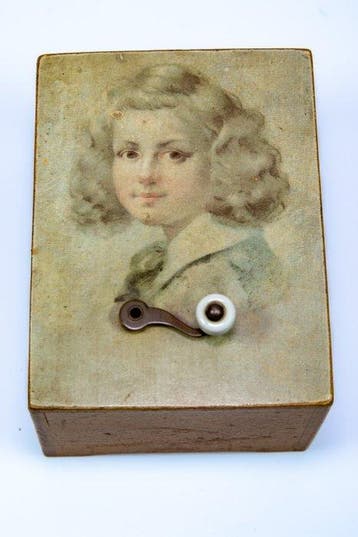 Antieke speeldoos manivelle carillon jongen Thorens -