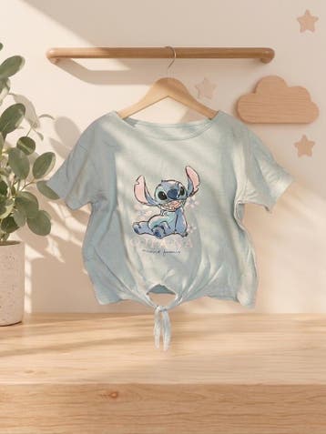 Disney Stitch T-shirt met knoopdetail maat 134-140, Gebruikt, Meisje, Disney Baby, Ophalen of Verzenden