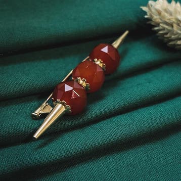 Vintage gouden broche met carneool, Gebruikt, Ophalen of Verzenden, Met edelsteen, Goud