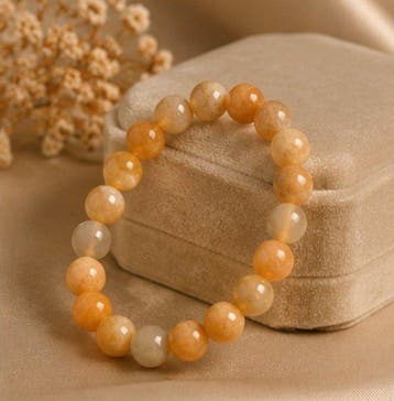 Natuurlijke fossielkoraal kralenarmband – warme aardetinten