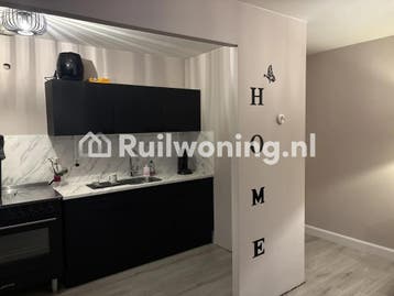 Ruim appartement begane grond met tuin en 2 slaapkamers