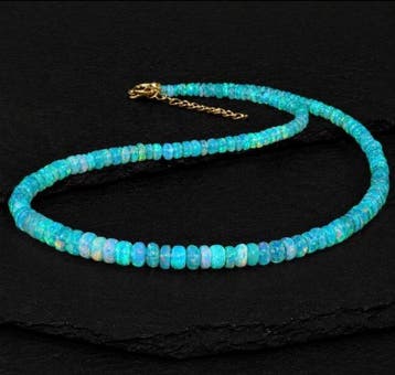 Elektrisch blauw Ethiopisch opaal ketting – geslepen