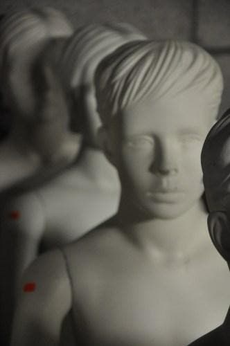 Gestyleerde kinderfiguren met hoofd