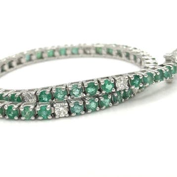 Tennis armband - 18 karaat Witgoud - 5.65ct. tw. Smaragd -