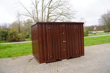 Deze goedkope schuur geeft een unieke stijl aan uw tuin